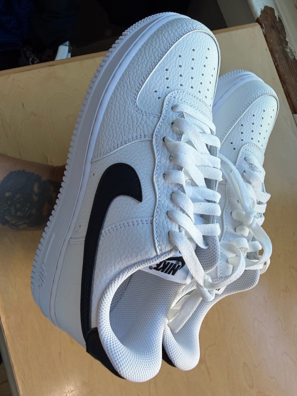 Nike men’s size 7.5 White Sneakers with Black Swoosh - Low Top